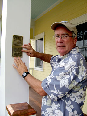 builder displays a plaque awarded